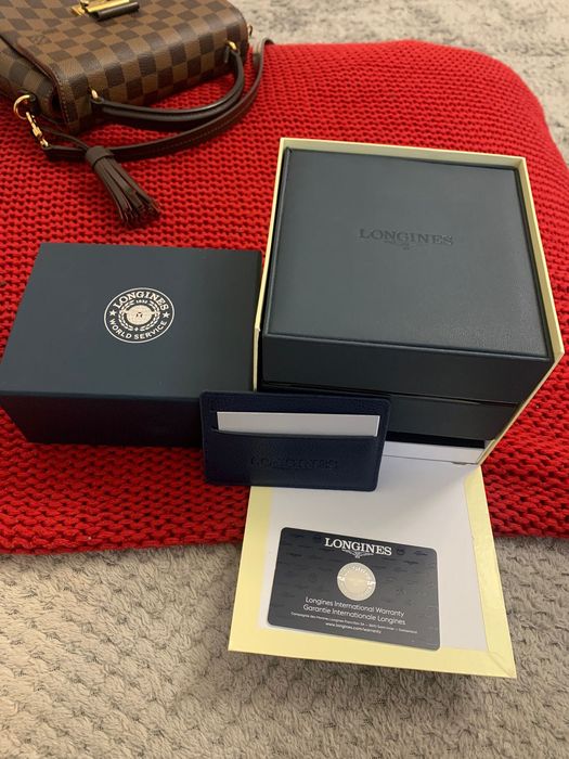 Longines Conquest V.H.P. Chronograph watch in black PVD with a blue.