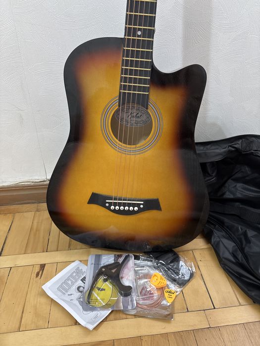 Getara acustik yangi sotiladi 400 000 ming kelishamiz