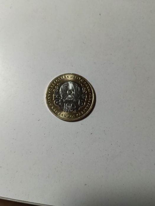 Продам монеты сто двести тенге