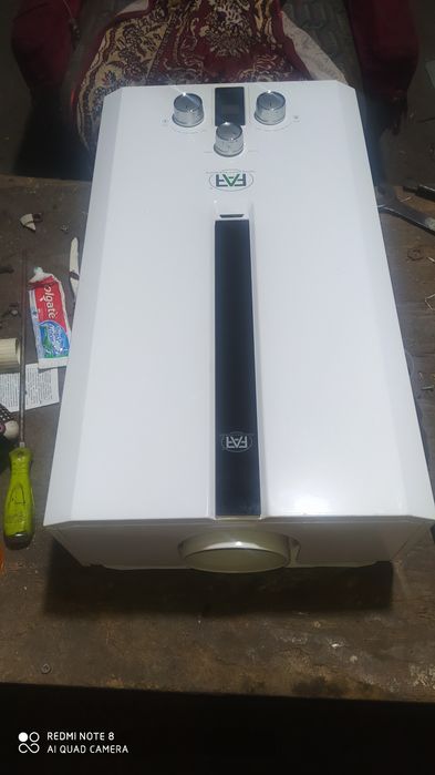 Газовая колонка 10 литровый за минута состояние отличное идеально