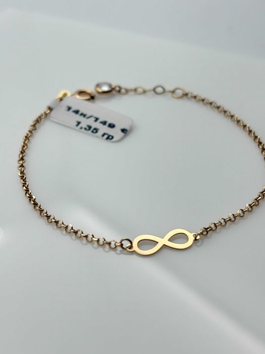 Дамска златна гривна с infinity символ