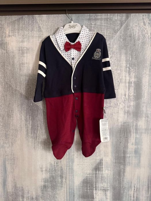 Продам новый костюмчик 6 месяцев