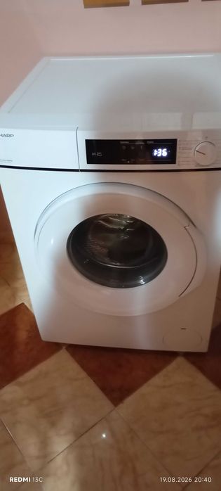masina de spalat rufe SHARP este ca noua si muult sub pret