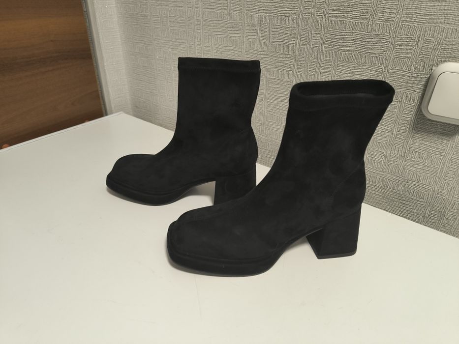 Продам новые ботинки