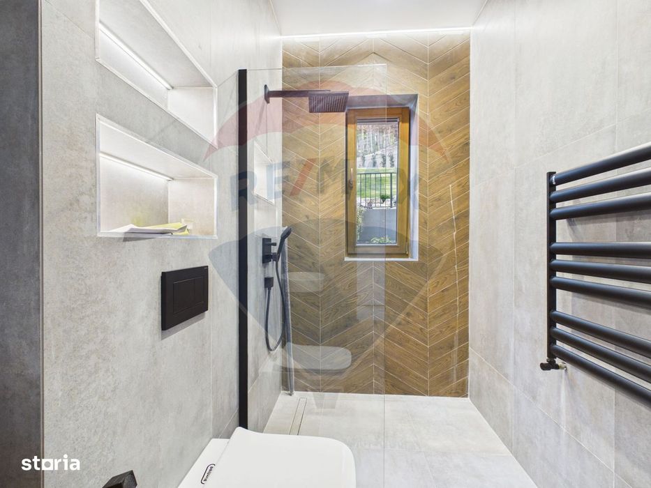 Apartament parter cu 3 camere, curte proprie in inima padurii - Sinaia