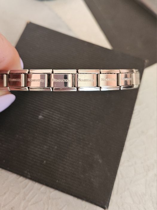 Гривна Nomination.