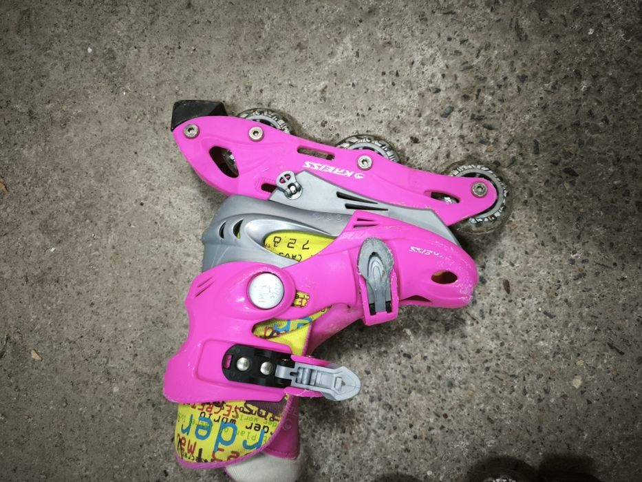 Роликовые коньки