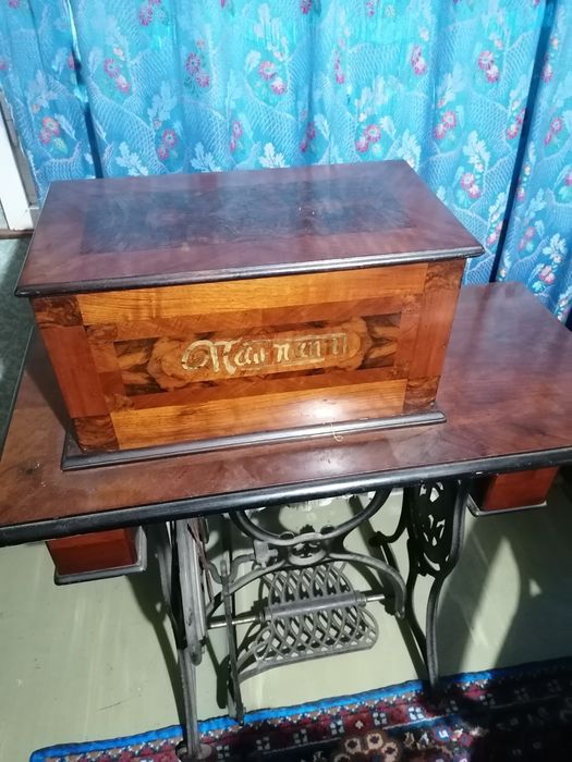 Mașină de cusut Singer