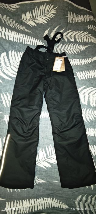 Новые зимние штаны на мальчика Reima размер 152