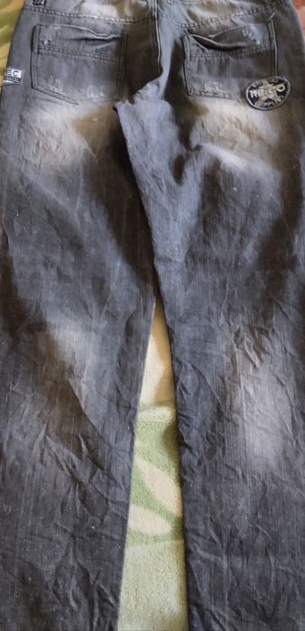 Джинсы (брюки) новые