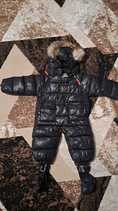 Зимние комбинезоны