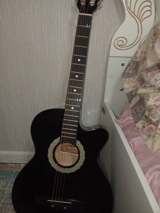 Гитара музыкальный инструмент