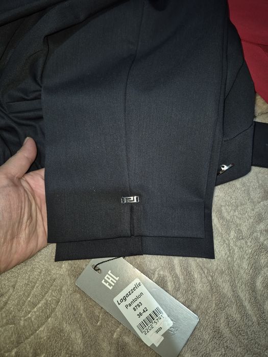 Продам брюки новые