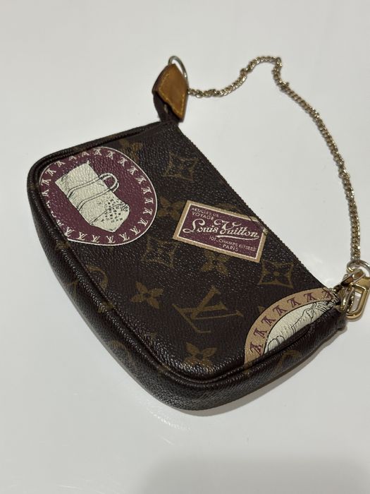Дамска мини чантичка-несесер Louis Vuitton Mini Pochette Accessoires Monogram Trunks