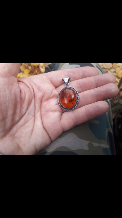 Серебряный кулон.