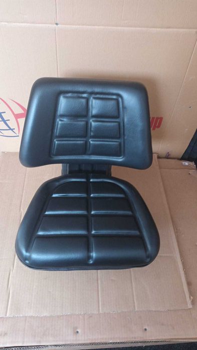 Scaun universal cu reglaj si amortizor pentru tractor