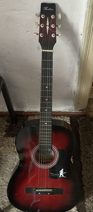 продамм  гитаруу