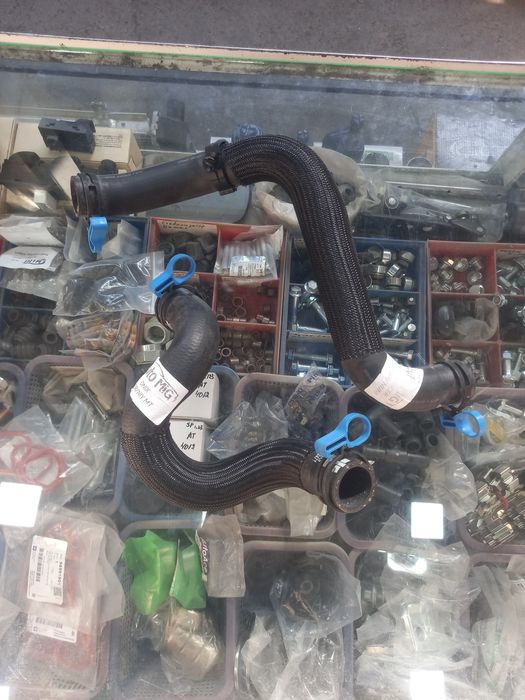 Потрубка радиатор Treker Onix Monza Malibu Kaptiva Tahoe Traverse