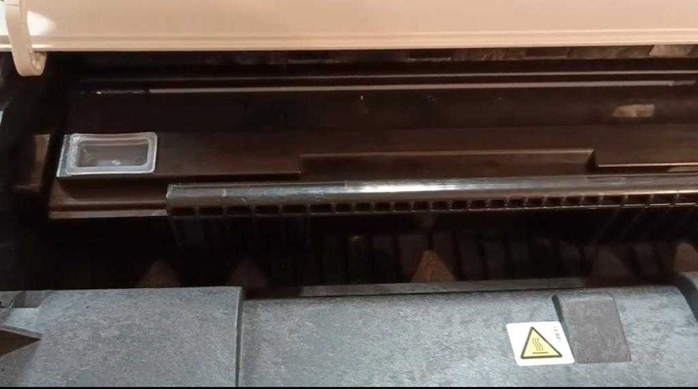 Принтер Ricoh Aficio SP 100