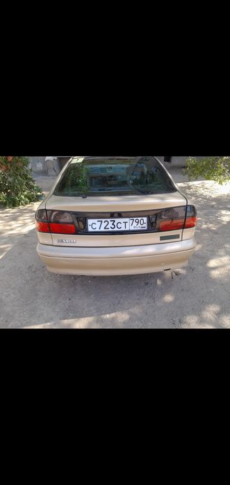 Машина Рено лагуна