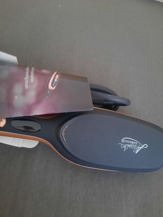 Четка за изправяне с горещ въздух