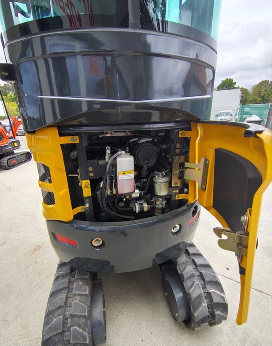 Багер Kubota Shantui