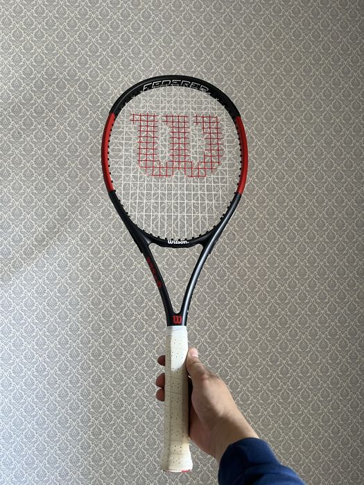 Теннисная ракетка