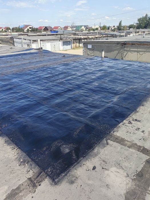 Кровля гаражей бикростом.