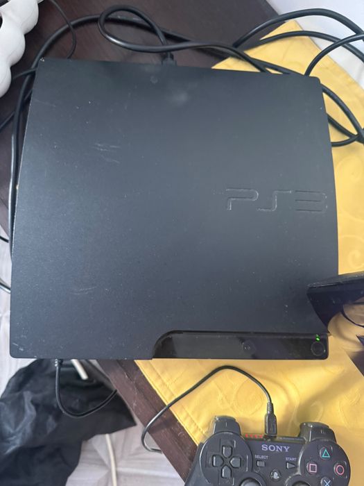 Vand ps3 slim modat cu o maneta