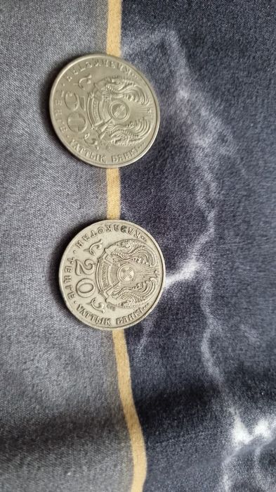 Продам монеты 50 и 20 тенге