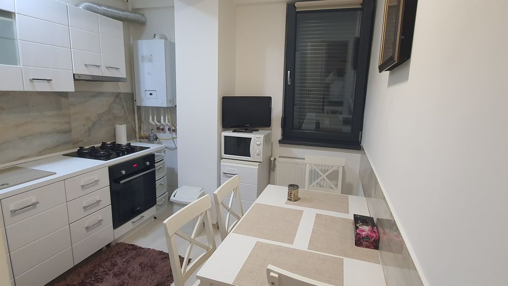 Proprietar inchiriez apartament , loc parcare, plus gradina, 2 camere