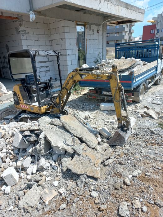 Curat si nivelez terenuri, transport moloz, mini utilaje de inchiriat