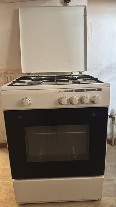 Газовый 4 камфорный плита.