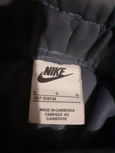 Pantaloni Nike tech albaștri