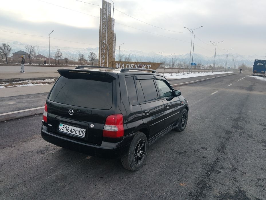 Mazda Demio 2003 г