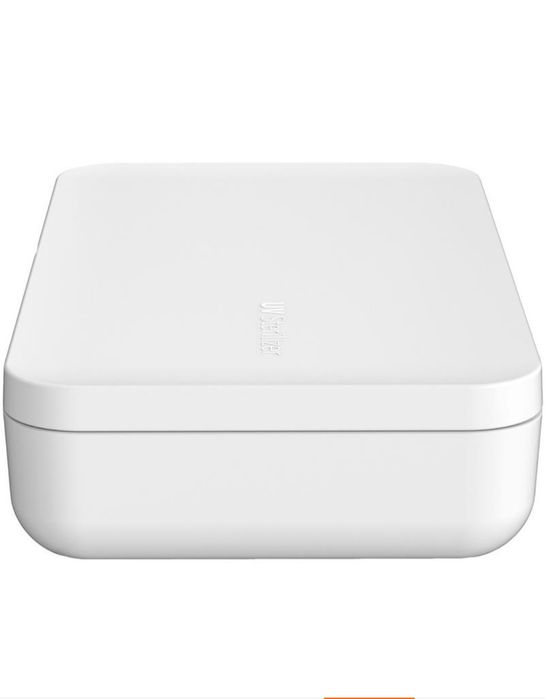 Уф- Стерилизатор с функцией беспроводного зарядного устройства.