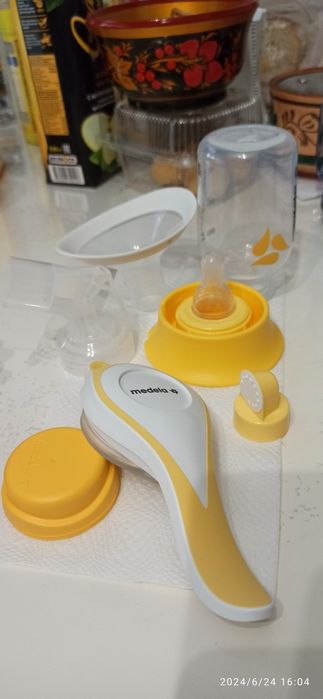Молокоотсос Medela
