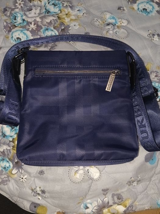 Барсетка новая продаю