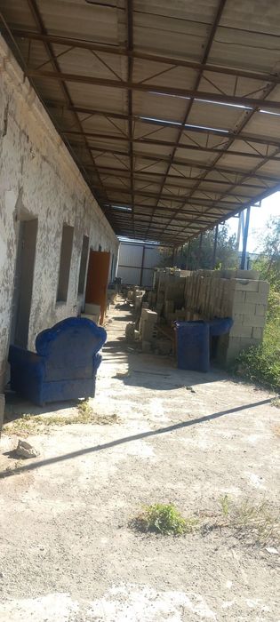 Урганч шахарда ишлаб чикаришга мулжалланган бино ва 20 сотик ер майдон