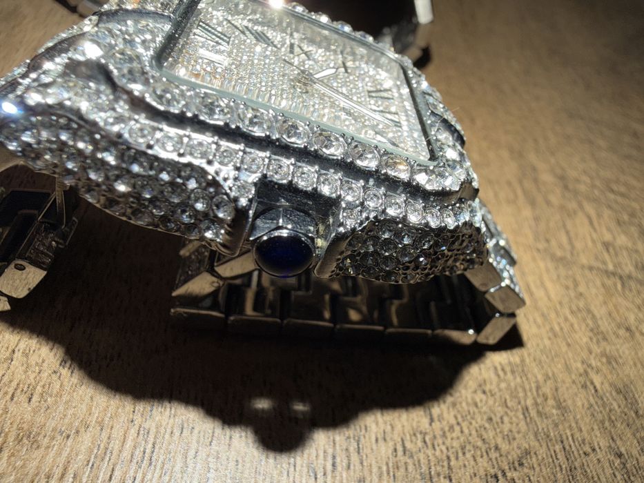Iced out cartier