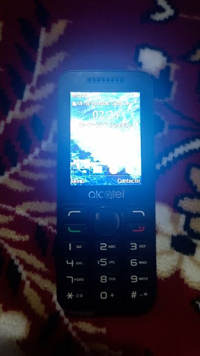 Super oferta telefon Alcatel+baterie externa tot la 100lei