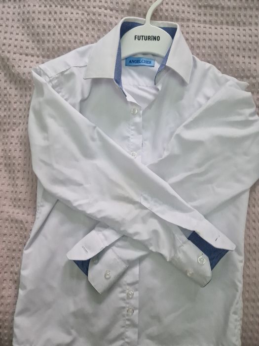 Продам белую рубашку на мальчика