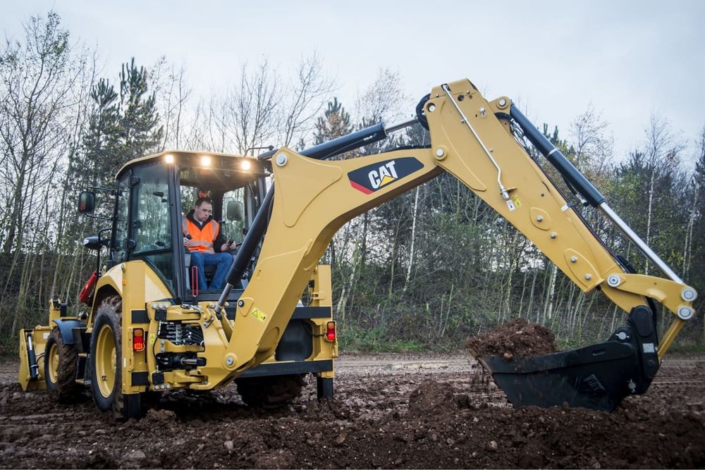 Экскаватор погрузчик .