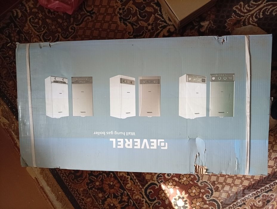 Продам газовый ( 2  контурный)  новый, упаковка