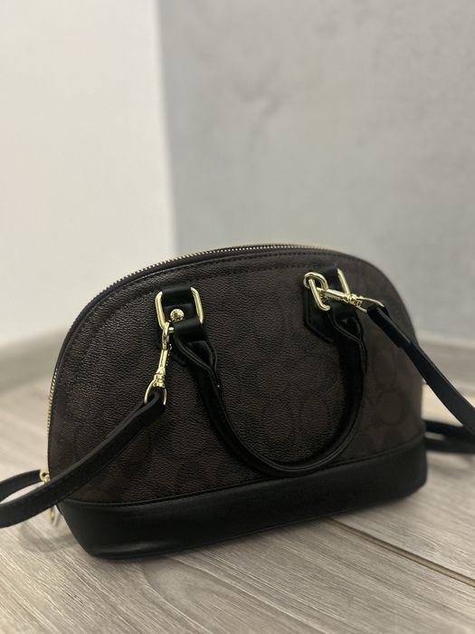 Geanta Coach  eleganta si practica