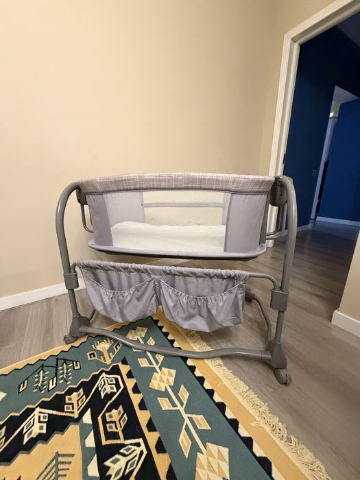 Манеж-качалка электрическая