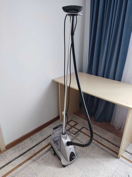 Паровой утюг или отпариватель