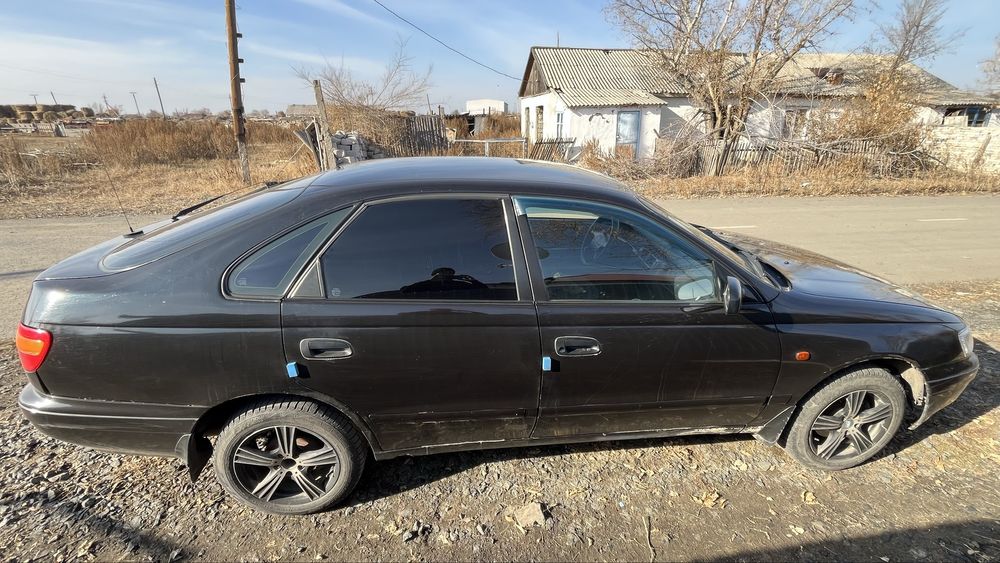 Тойота карина е.