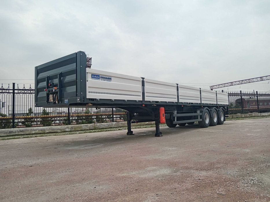 Полуприцеп бортовой контейнеровоз UzAutoTrailer