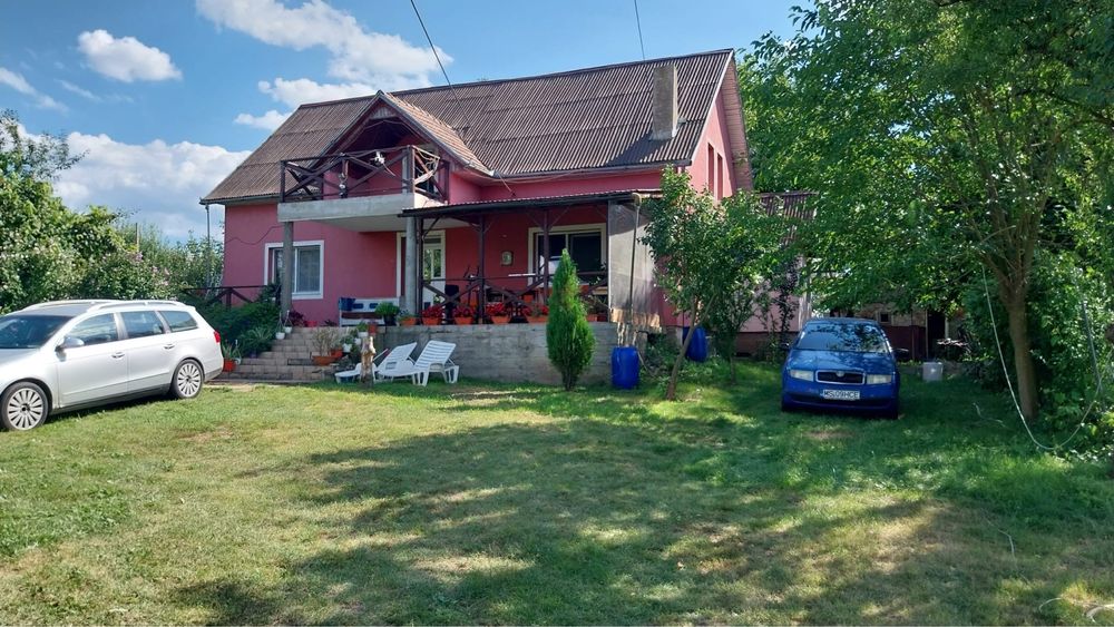 CASA  IN CUCI + 1 ha teren